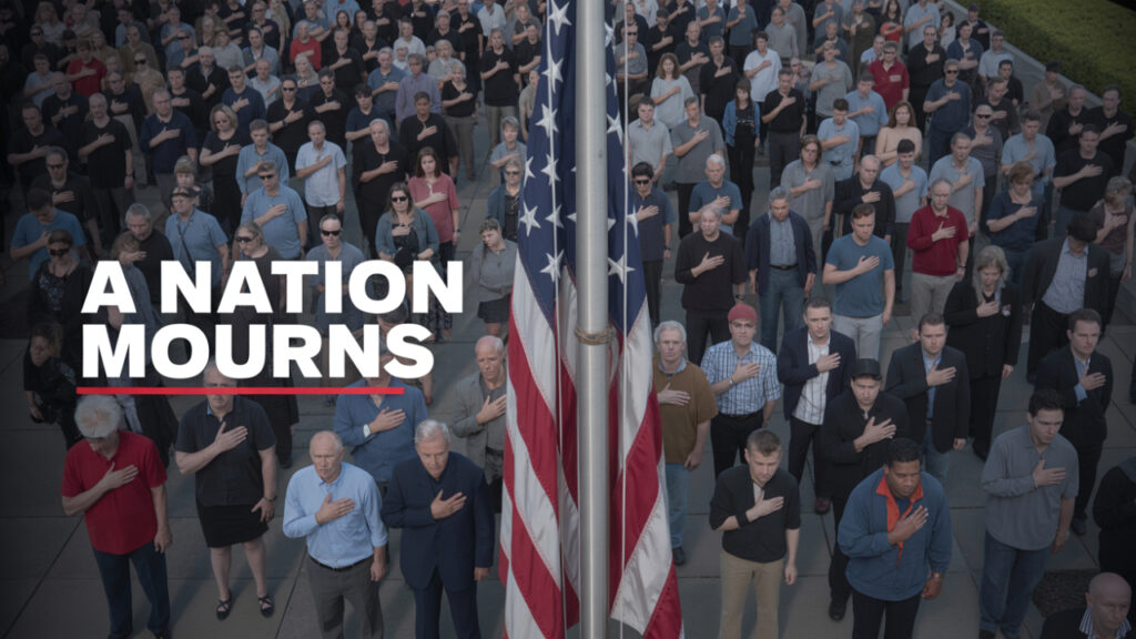 People honoring national tragedy as flag flies half mast